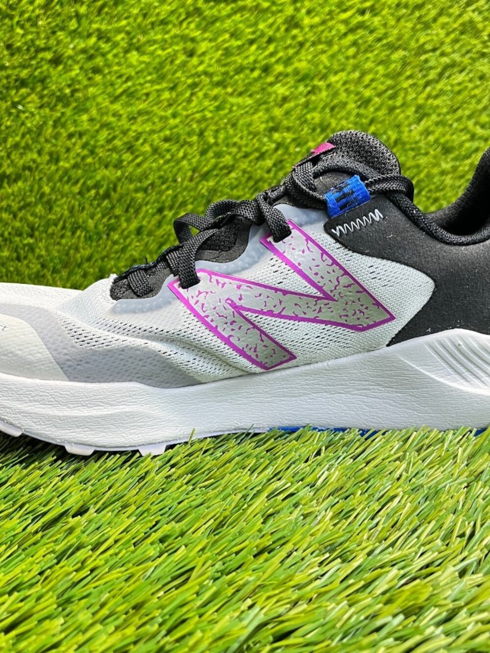 New Balance Women's White, Black & Pink All-Terrain Sneakers - Picture 3 of 11